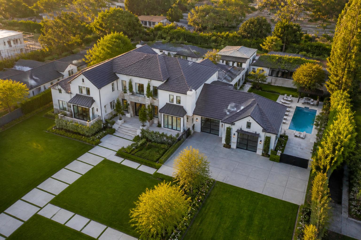 Aerial drone photo of a luxury suburban home